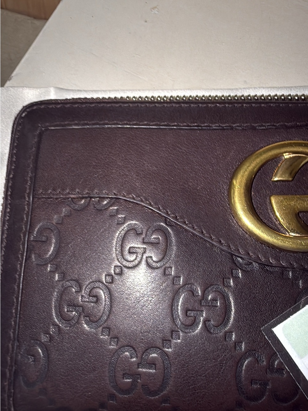 Gucci Guccissima zip-around wallet features signature embossed monogram leather - Picture 3 of 14
